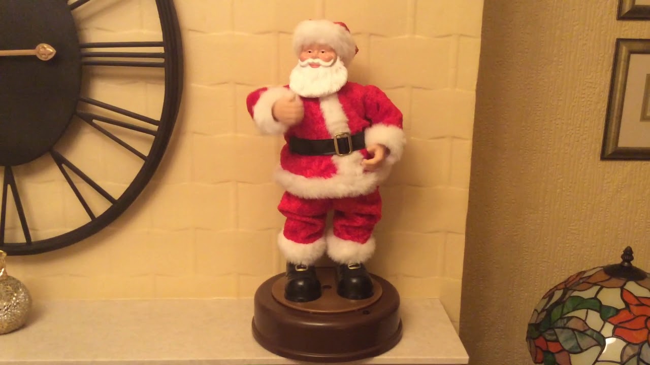 Singing and dancing Santa