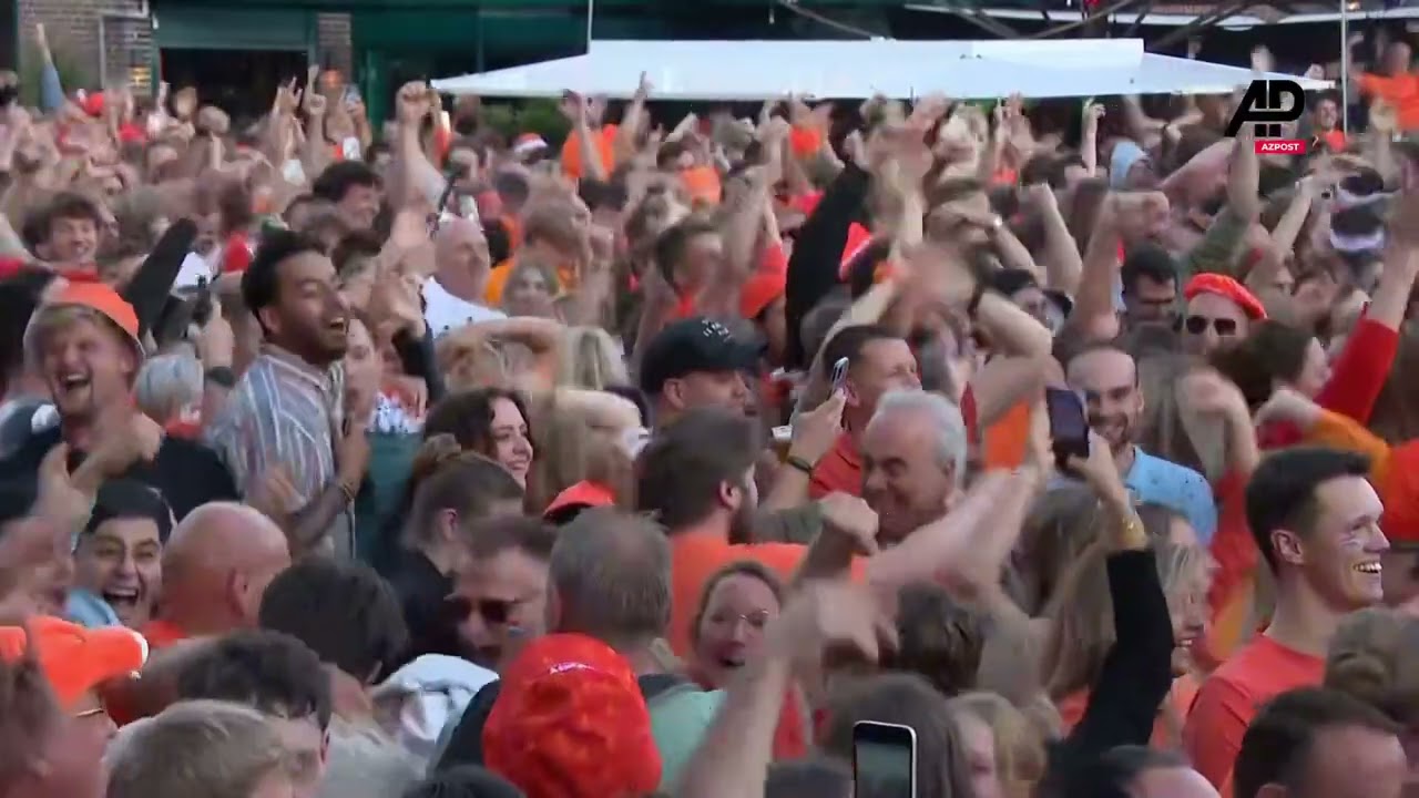 Dutch fans celebrate their team's opening goal against England