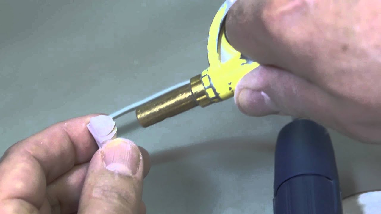 Dr. Lindner, Greenville Dentist, Trimming a Die