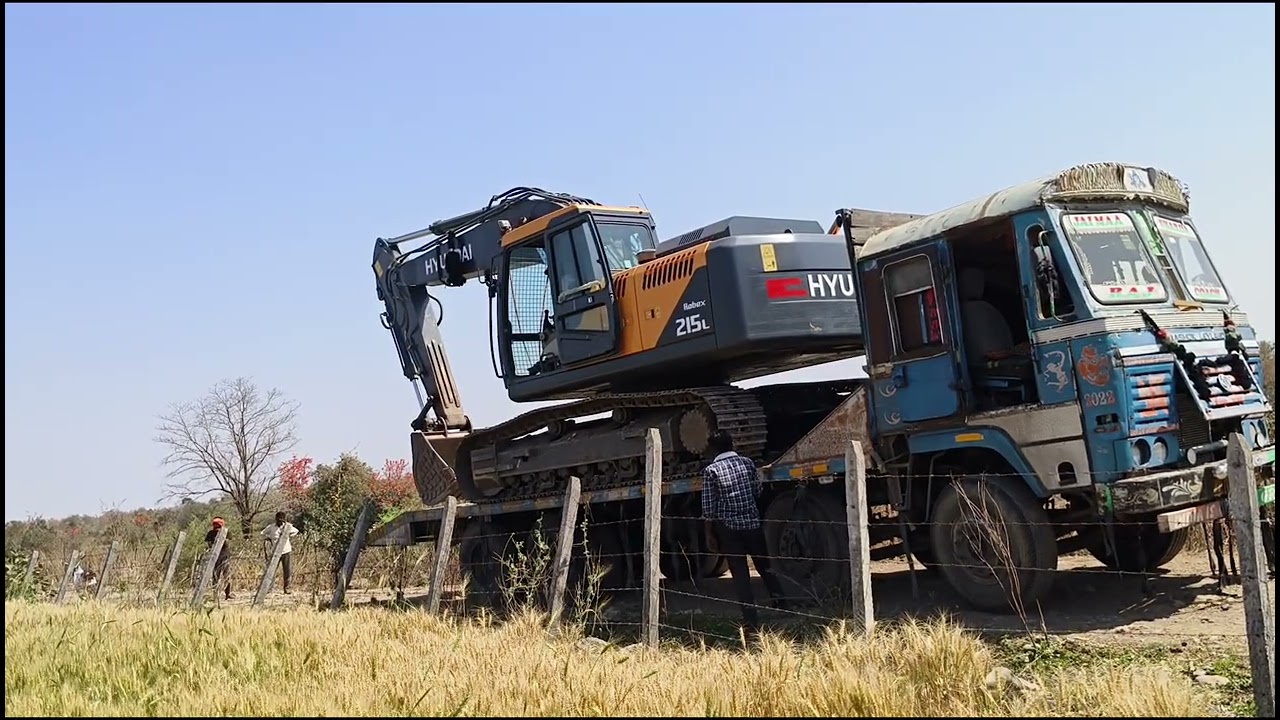 Hyundai 215 loading 12 tyre trailer😳😳😳