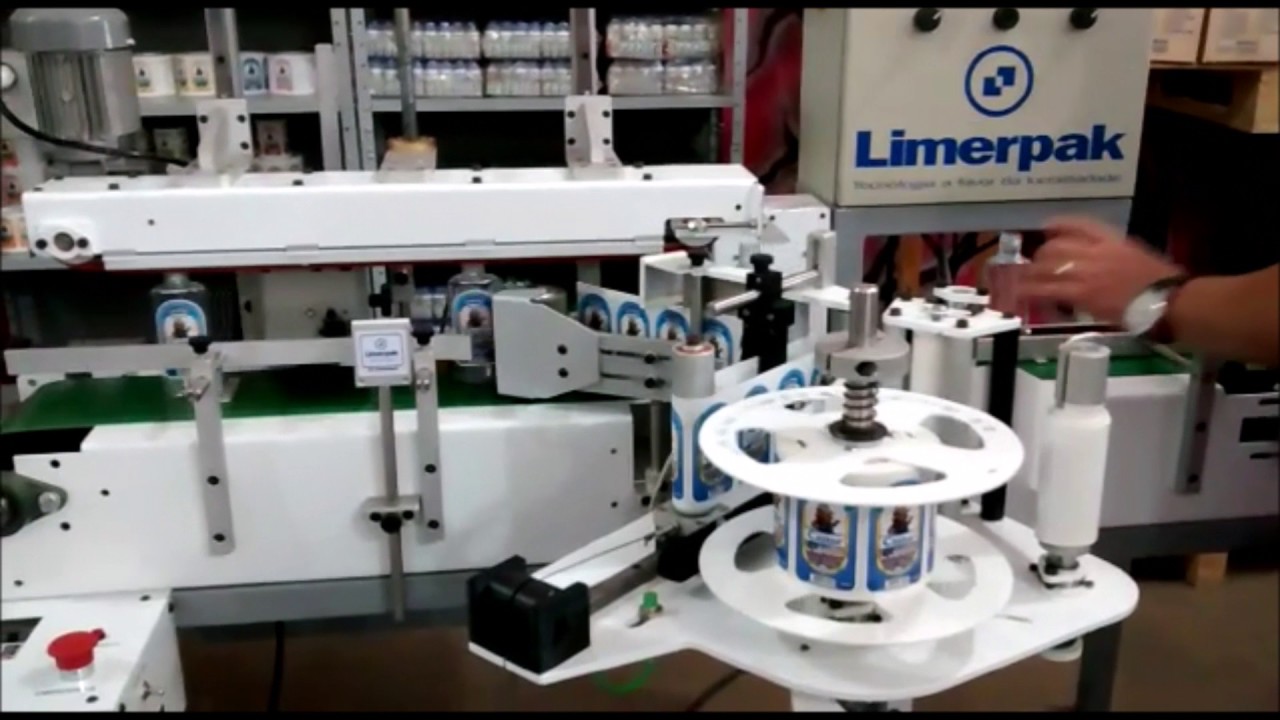 Limerpak | Rotuladora Automática aplicando rótulos em frascos