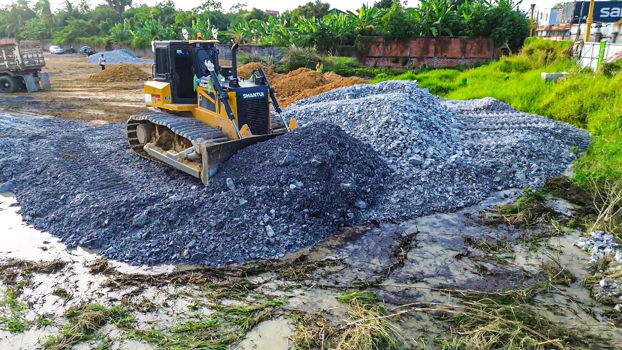 Perfect Finish Today! Skilled Dozer Operator Filling Flooded Lake with Stones & Dump Trucks