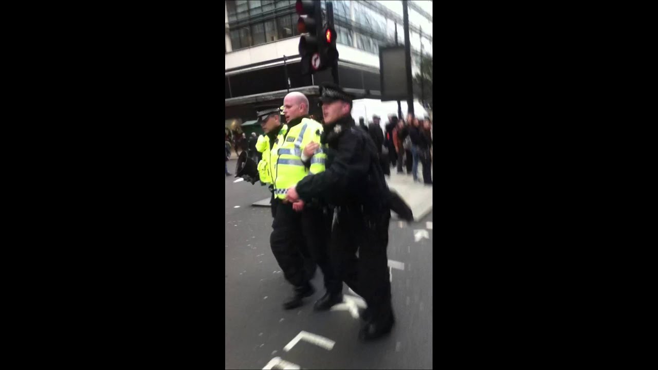 British Cop Loses it at Anti-Austerity March - Has to be Taken Away