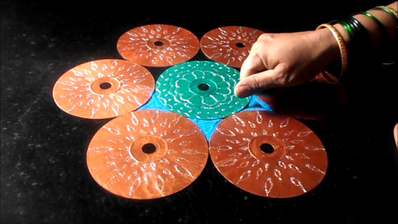 Easy rangoli designs for New Year  | creative rangoli ideas with cd cotton buds | Sudha Balaji