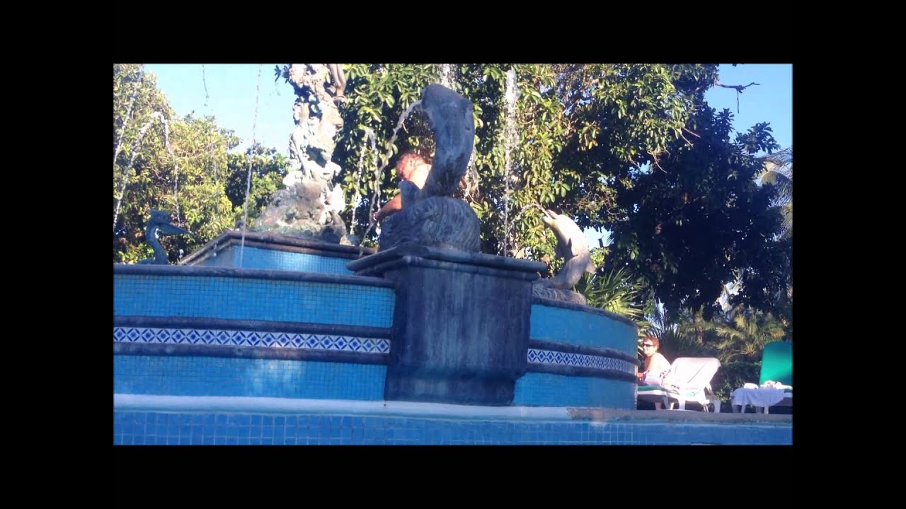 Drunk man pissing in pool.