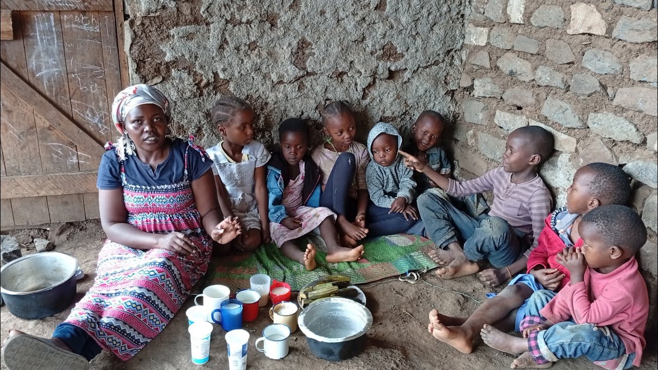 African village life # cooking milky cornmeal porridge with unpeeled boiled green bananas