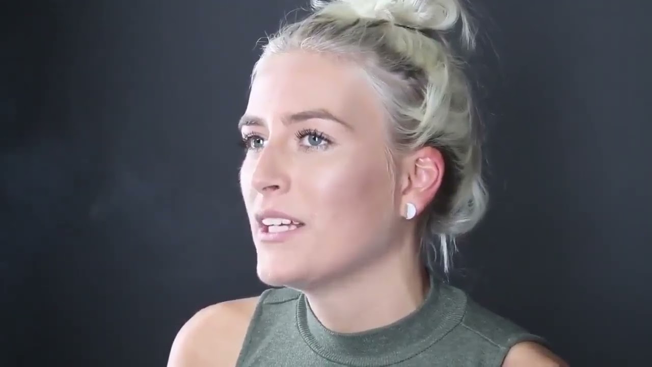 Bottle blonde smokes a cigarette