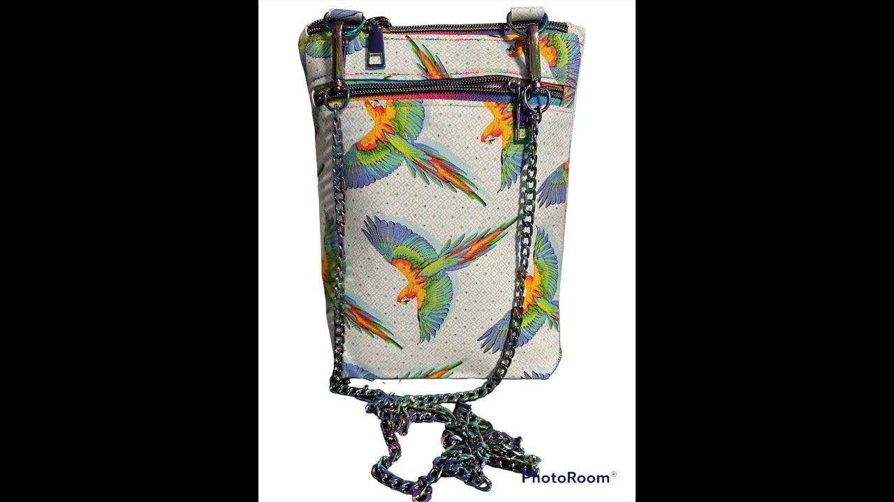 Phoebe: a gusseted flat bottom double zipper crossbody in the hoop of an embroidery machine.