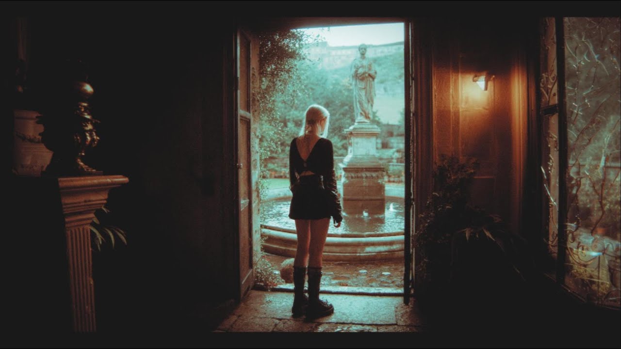 daughter of Caligula daydreams by the fountain