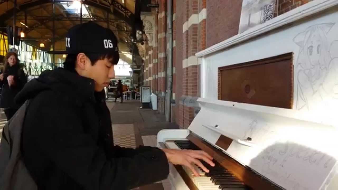 Yiruma's River flows in you & Pachelbel's Canon in D public piano cover @ train station by Khoi Pham