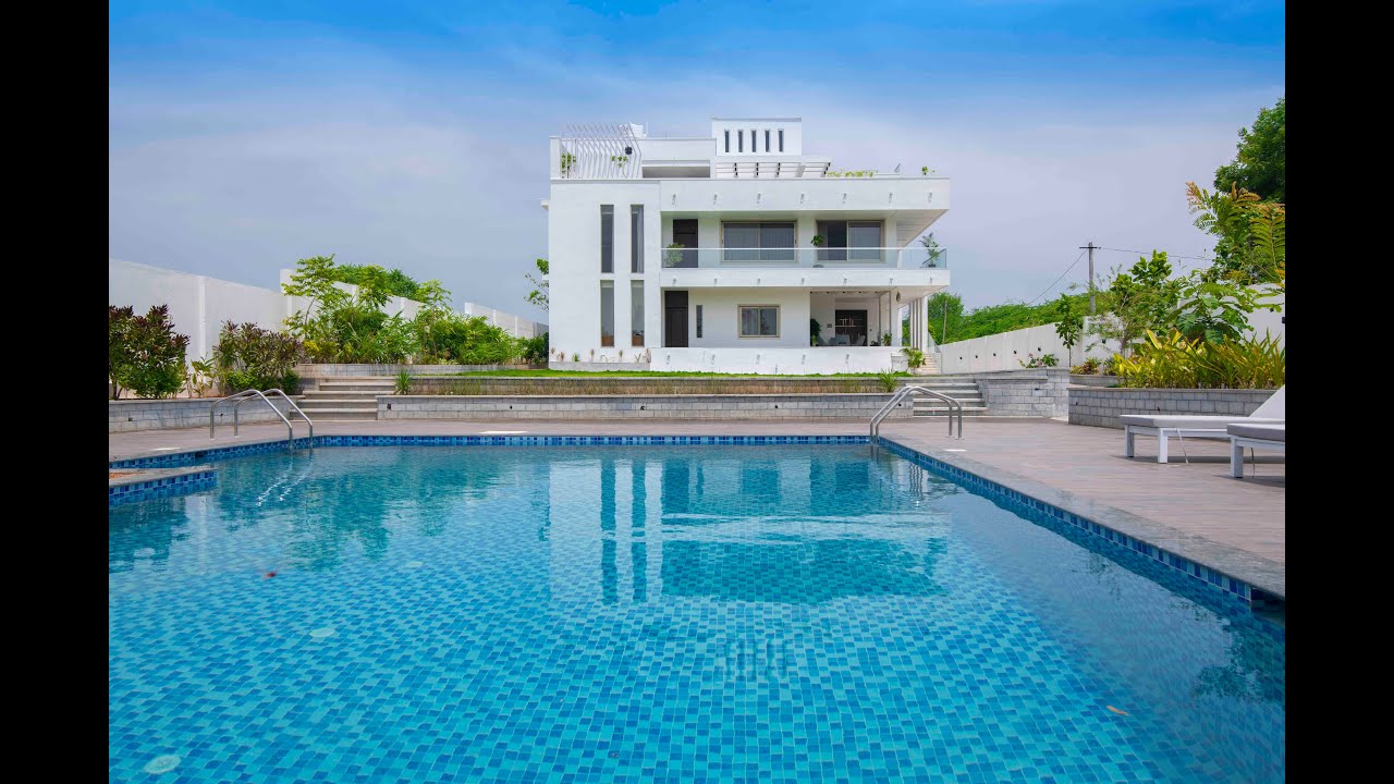 Contemporary pool facing house by Padma & Prabhakar designs. | Architecture & Interior Shoots |