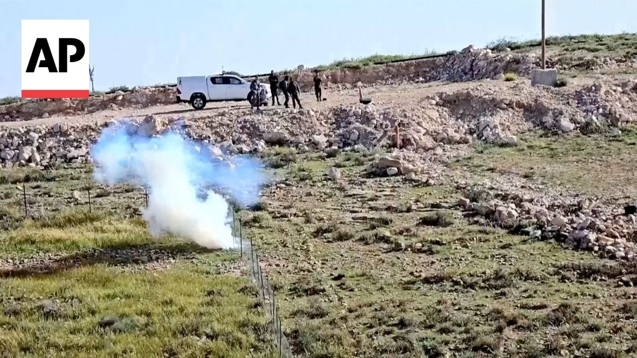 Israeli settlers block West Bank road that children use to walk to school
