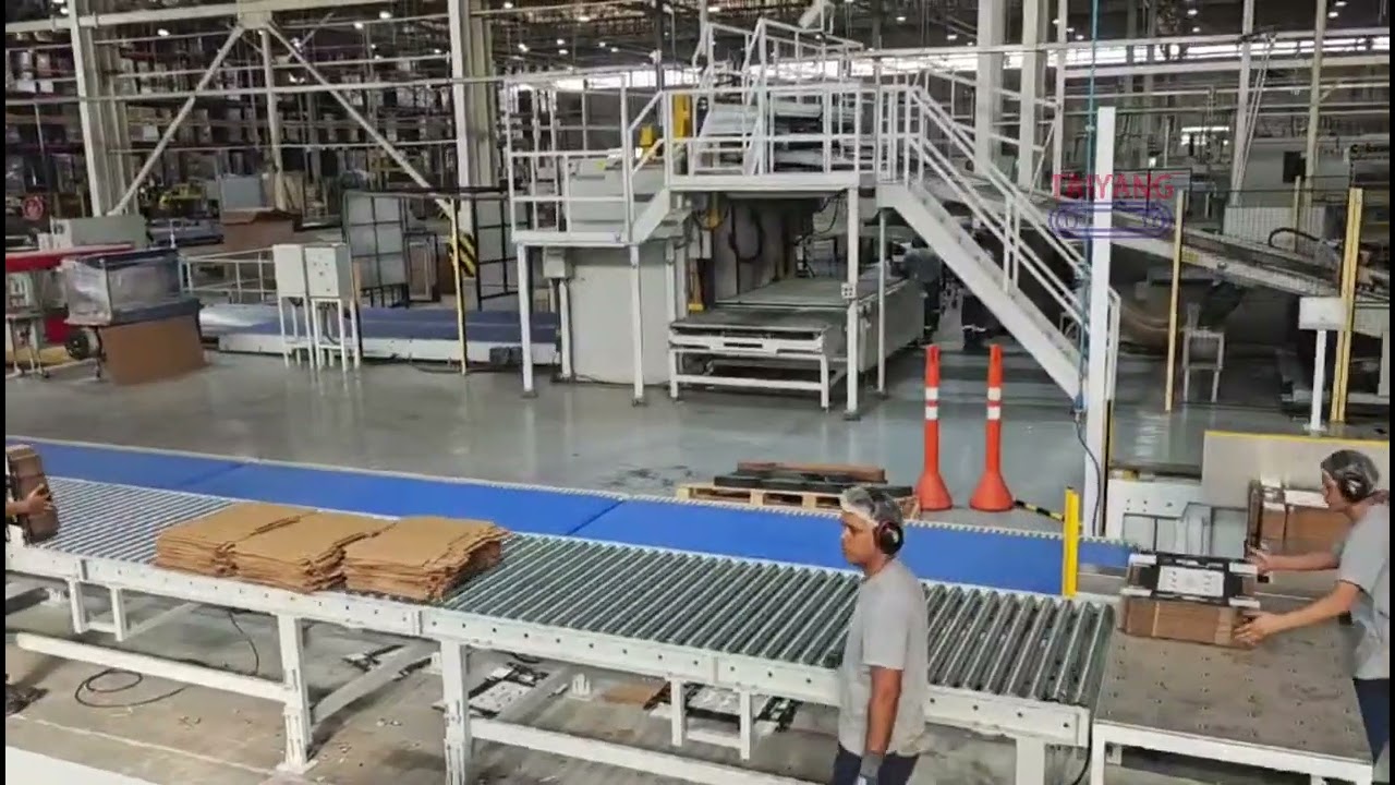 Load former system integrated with rotary die-cutting production line.