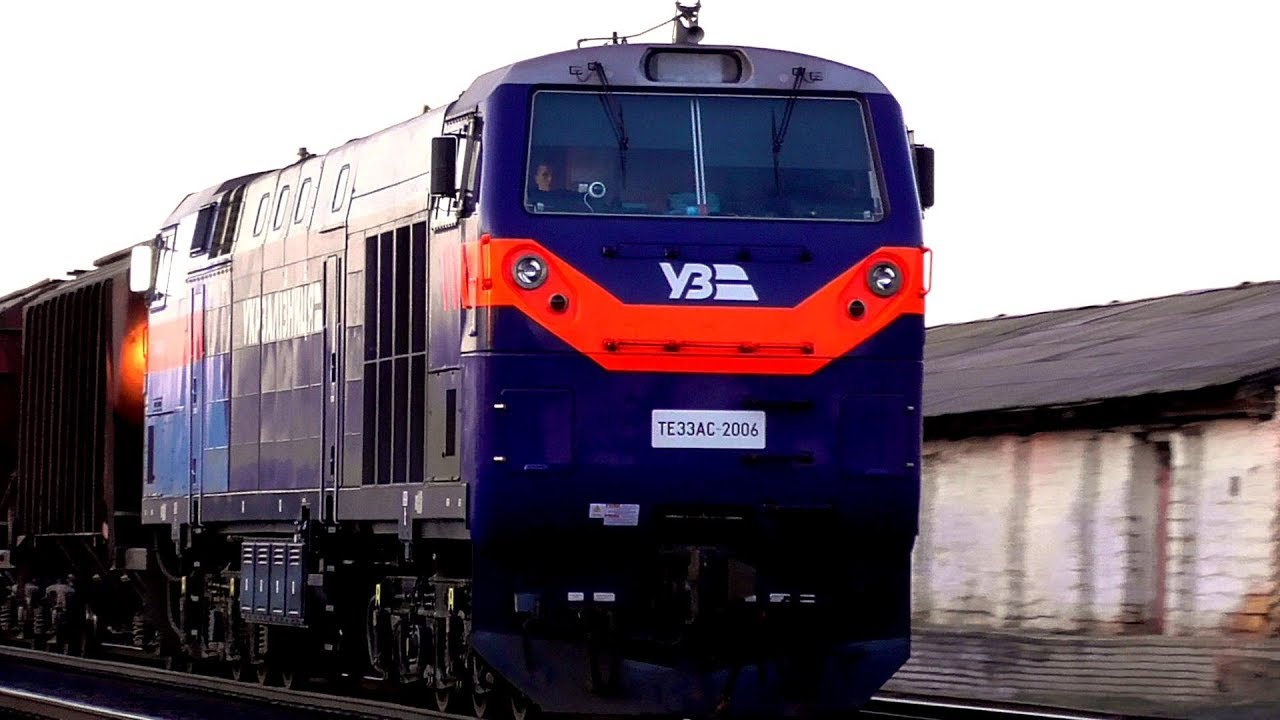 General Electric  ТЭ33АС-2006 с грузовым поездом