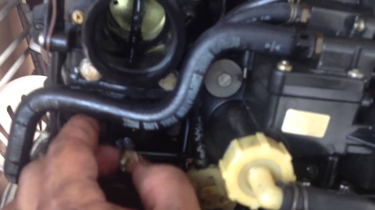 outboard carburetor water removal
