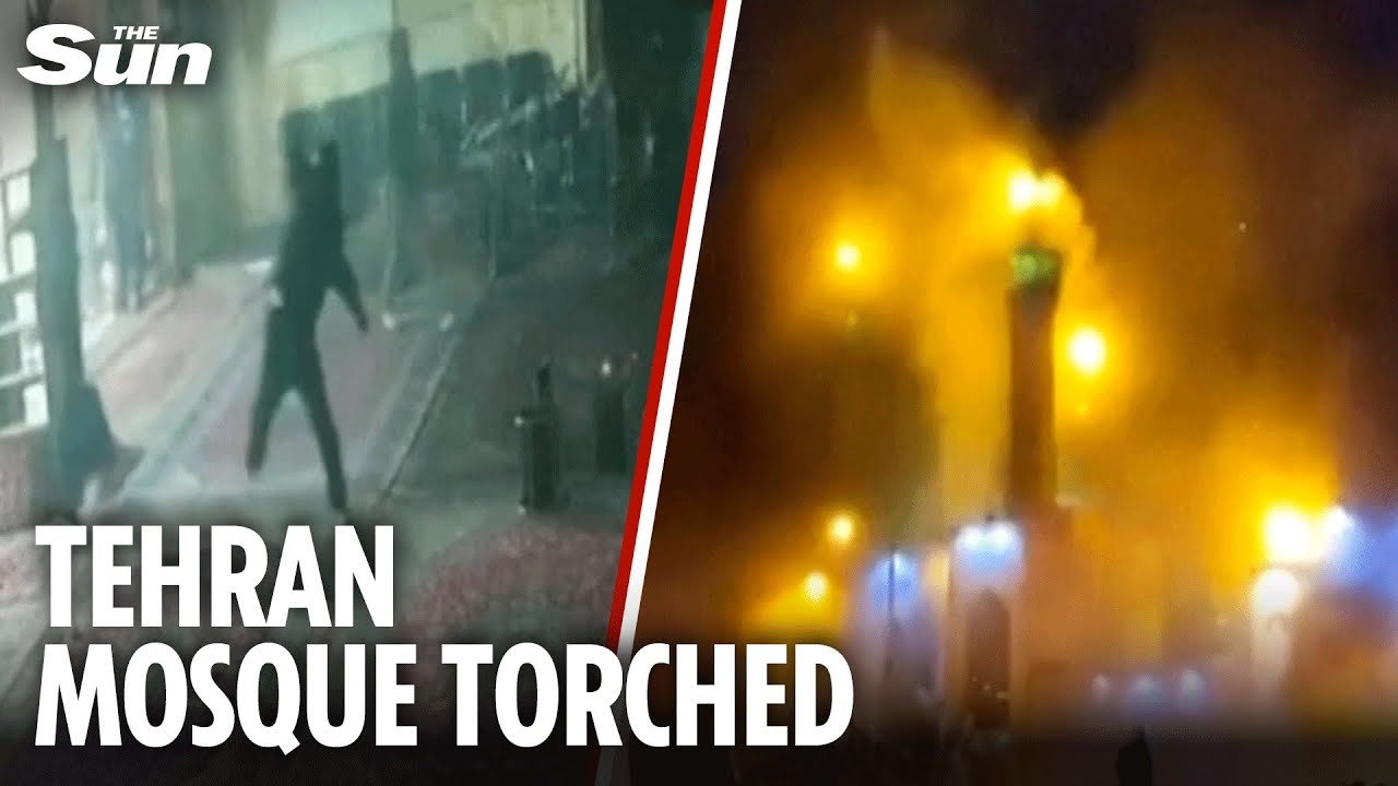 Moment Iranian protesters set fire to mosque in Tehran