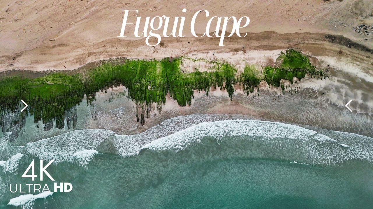 4K: Fugui Cape: Taiwan's Northernmost Point with Mossy Coastline and volcanic rocks. (新北市石門區富貴角公園)