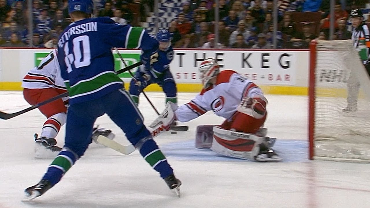 Sven Baertschi finishes tic-tac-toe from Elias Pettersson