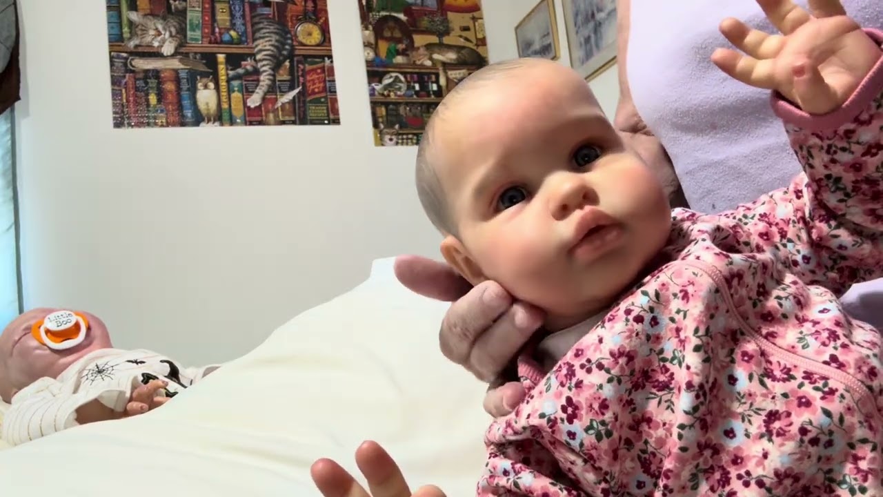 Baby Changing into Halloween Jammies