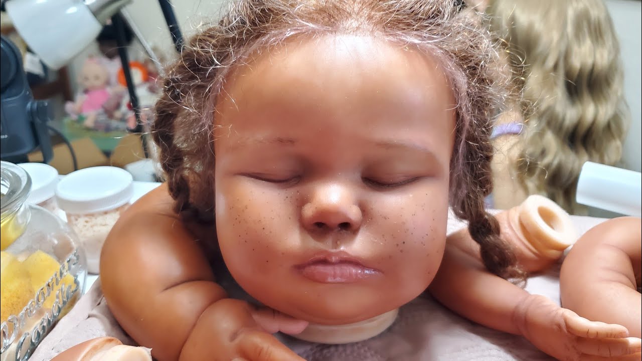 Finishing up painting realborn 7 month June. Bountiful baby reborn. Those freckles! 😍