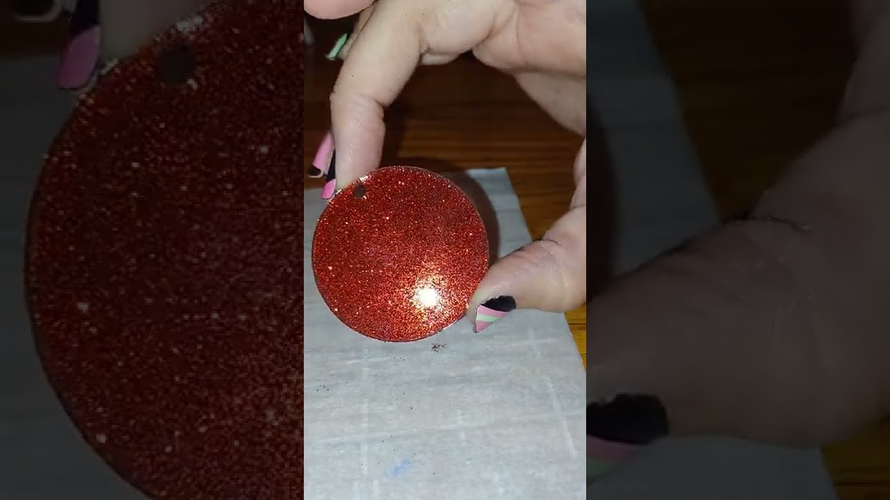 update on epoxy keychains. less epoxy is still good enough. layer of glitter added as well.