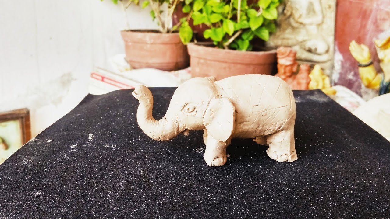 Making clay elephant