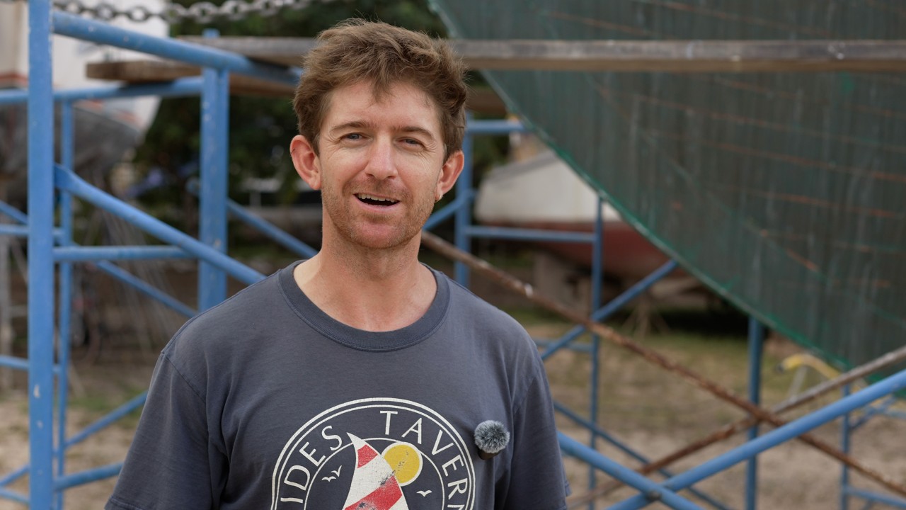 Tropical boatyard woodwork - repairing planks and painting the boat in a thunderstorm!