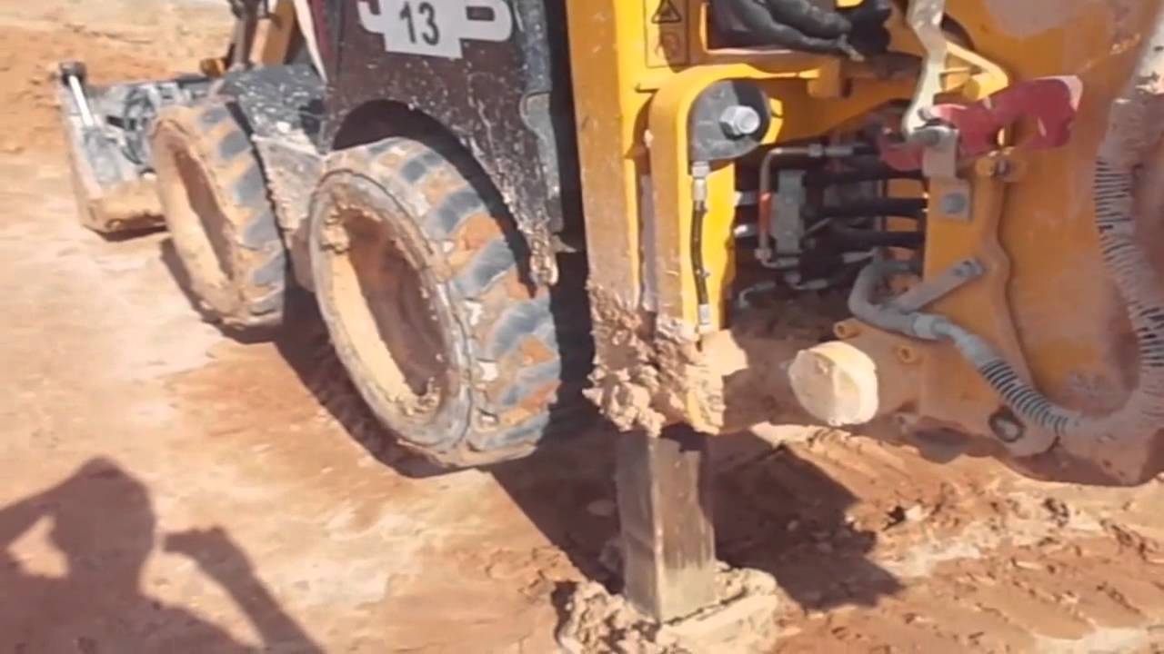 Mini retroescavadeira JCB 1CX vídeo aula