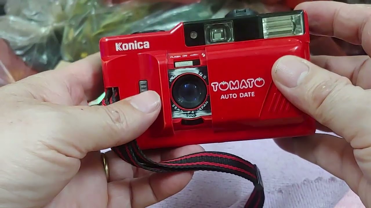 Test m&aacute;y phim Konica Tomato auto Date