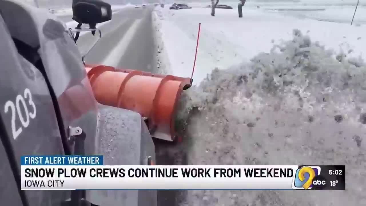Iowa City snowplow crews work to keep streets clear as winter weather begins
