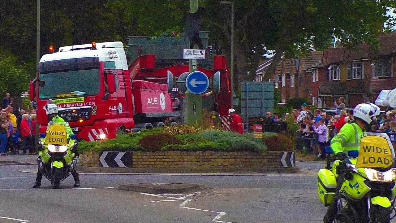 70m 145 tonne lorry meets small Surrey roundabout.