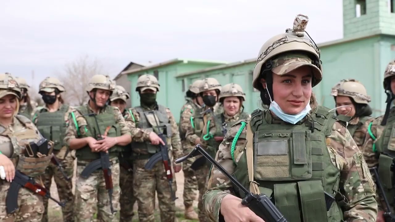 Peshmerga female battalion coordinates with Coalition advisory team