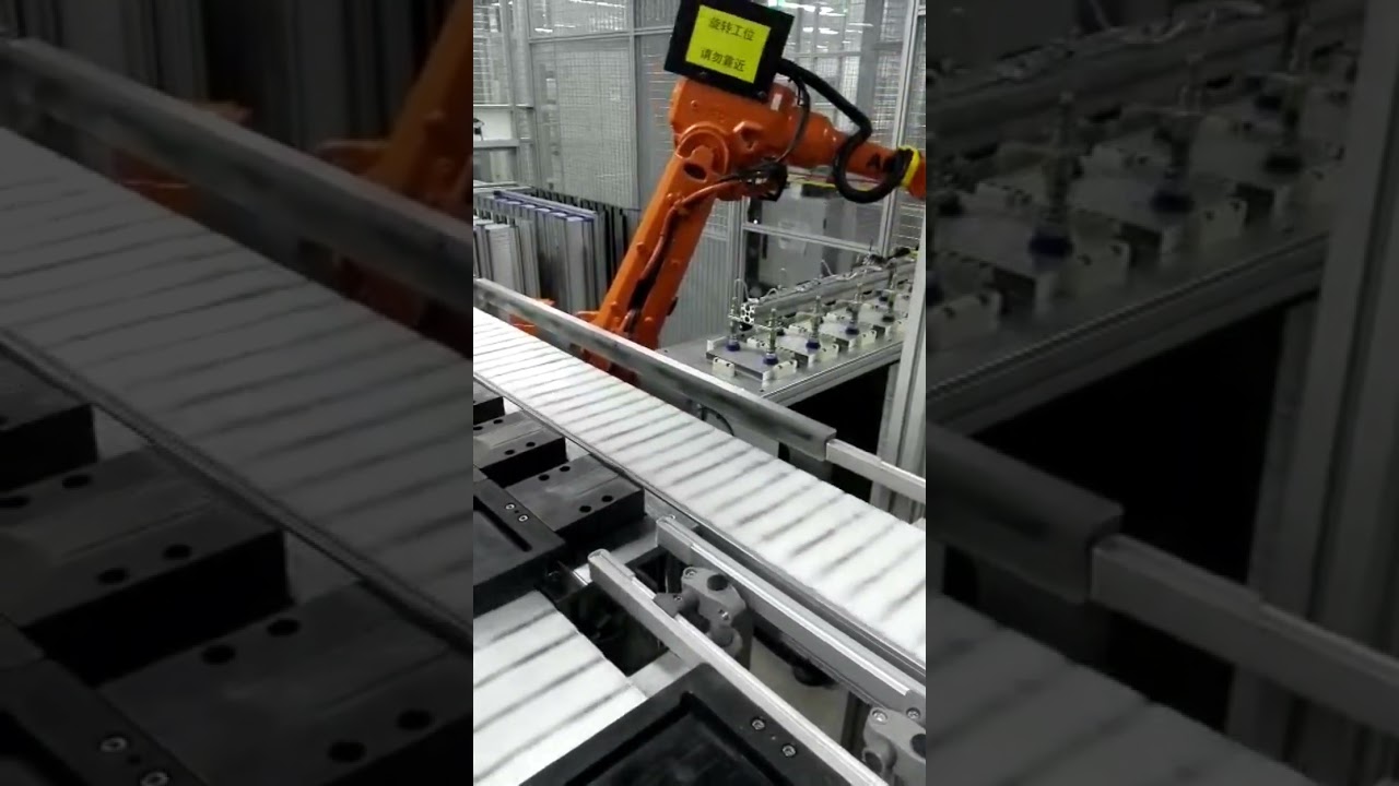 Automated assembly by pallet conveyor system | pallet transfer systems and robotic arm