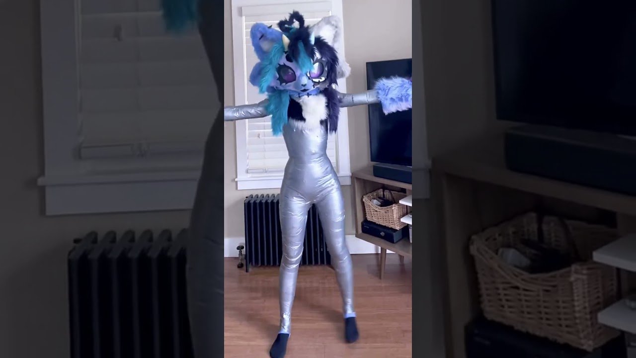 hehe making a duct tape dummy for my new fursuit bodysuit !!