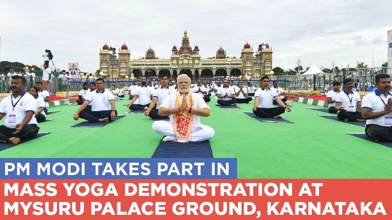 PM Modi takes part in mass yoga demonstration at Mysuru Palace Ground, Karnataka