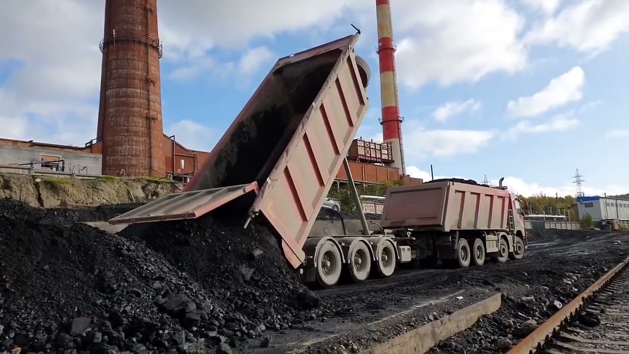 Volvo dump truck with MEGA trailer   coal unloading