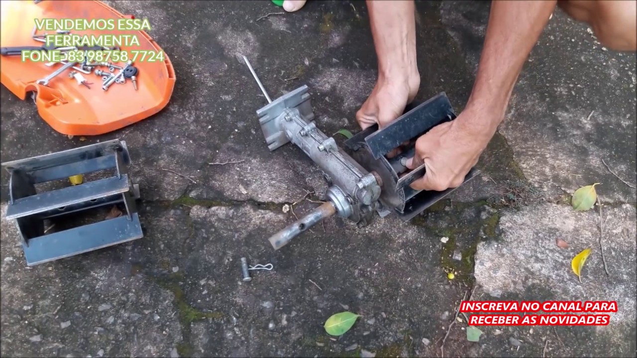 MONTANDO A ENXADA ROTATIVA NA ROÇADEIRA