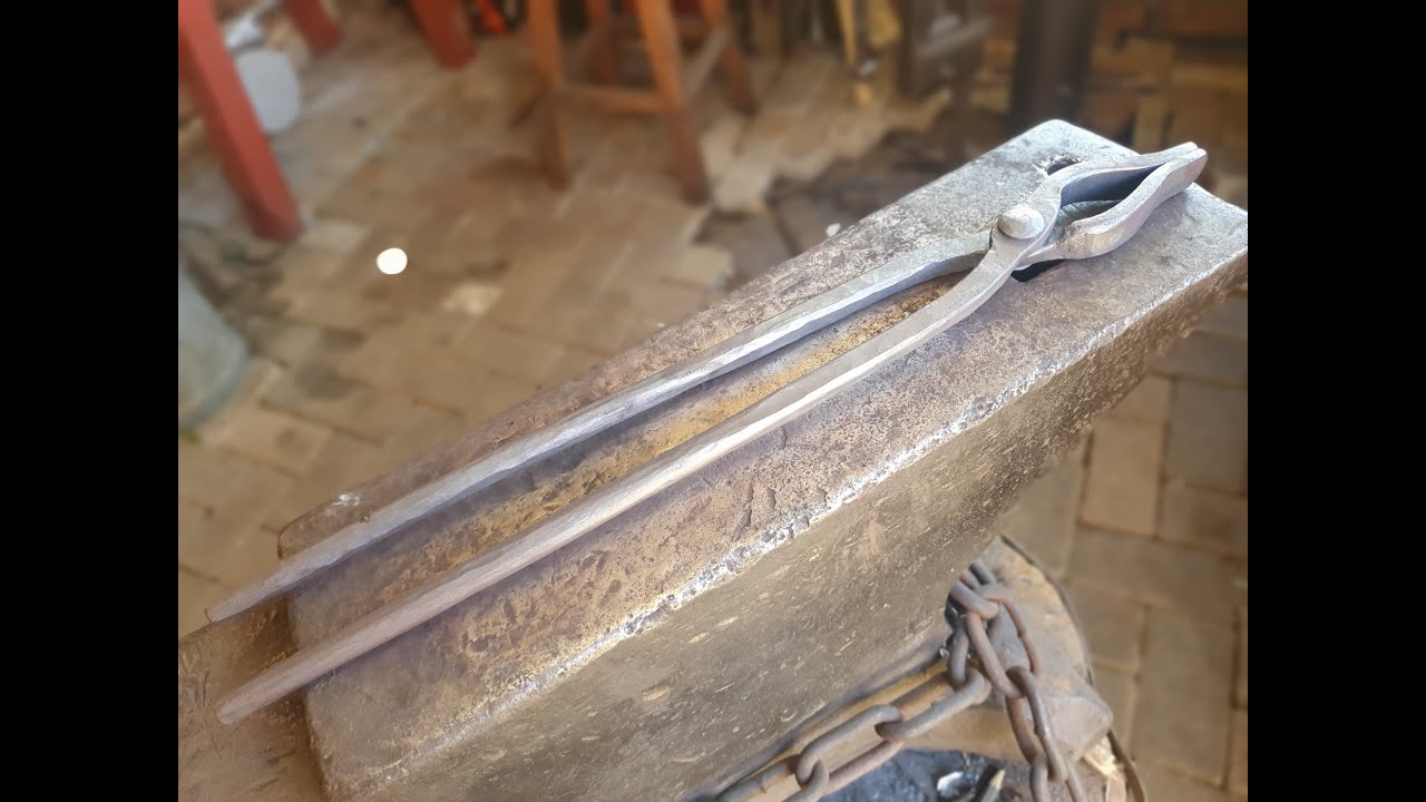 Blacksmith's flat bit tongs from coil spring