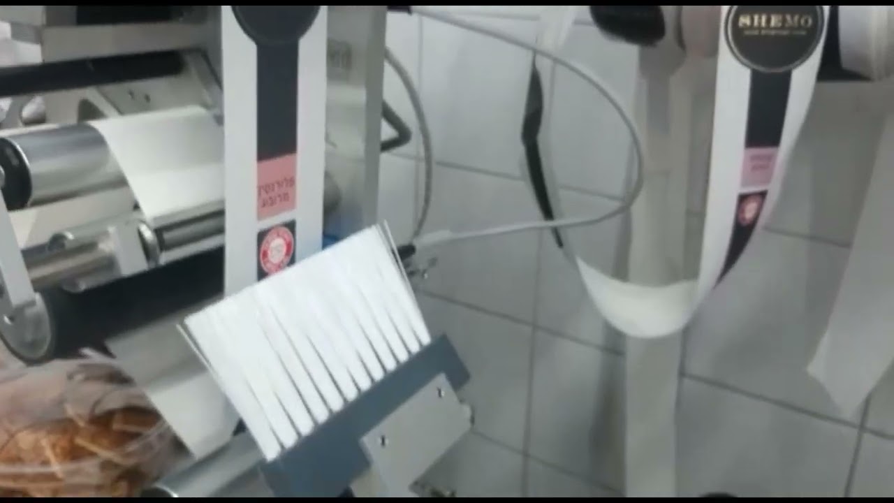 Top- Side and Bottom Print and Apply labeling machine by TADBIK
