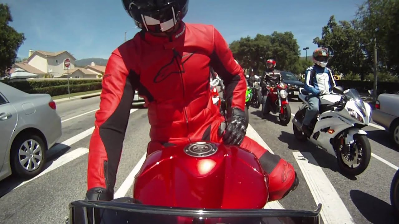 Go Pro HERO - A Rider in 1 Piece ALPINESTARS Red Leather Suit