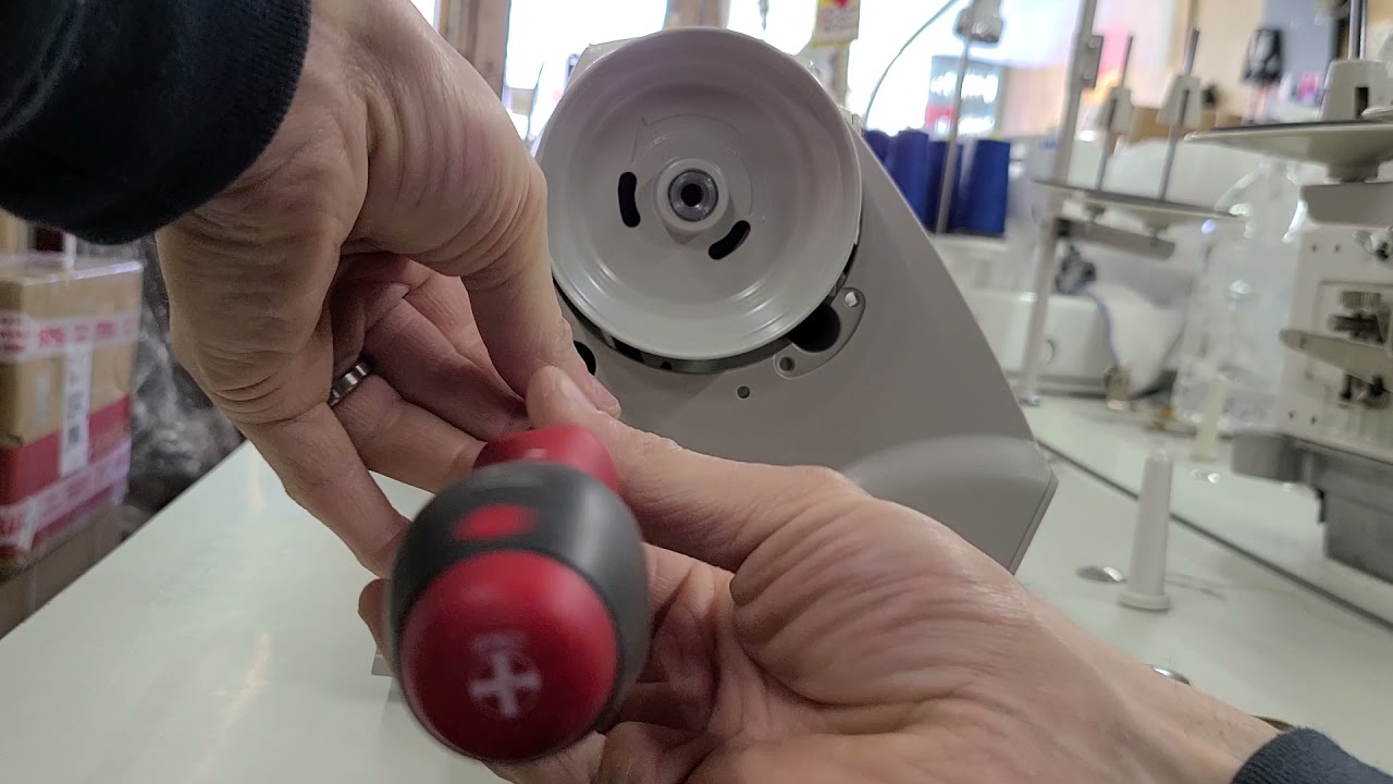 How to remove a Juki DDL-8700 belt guard.
