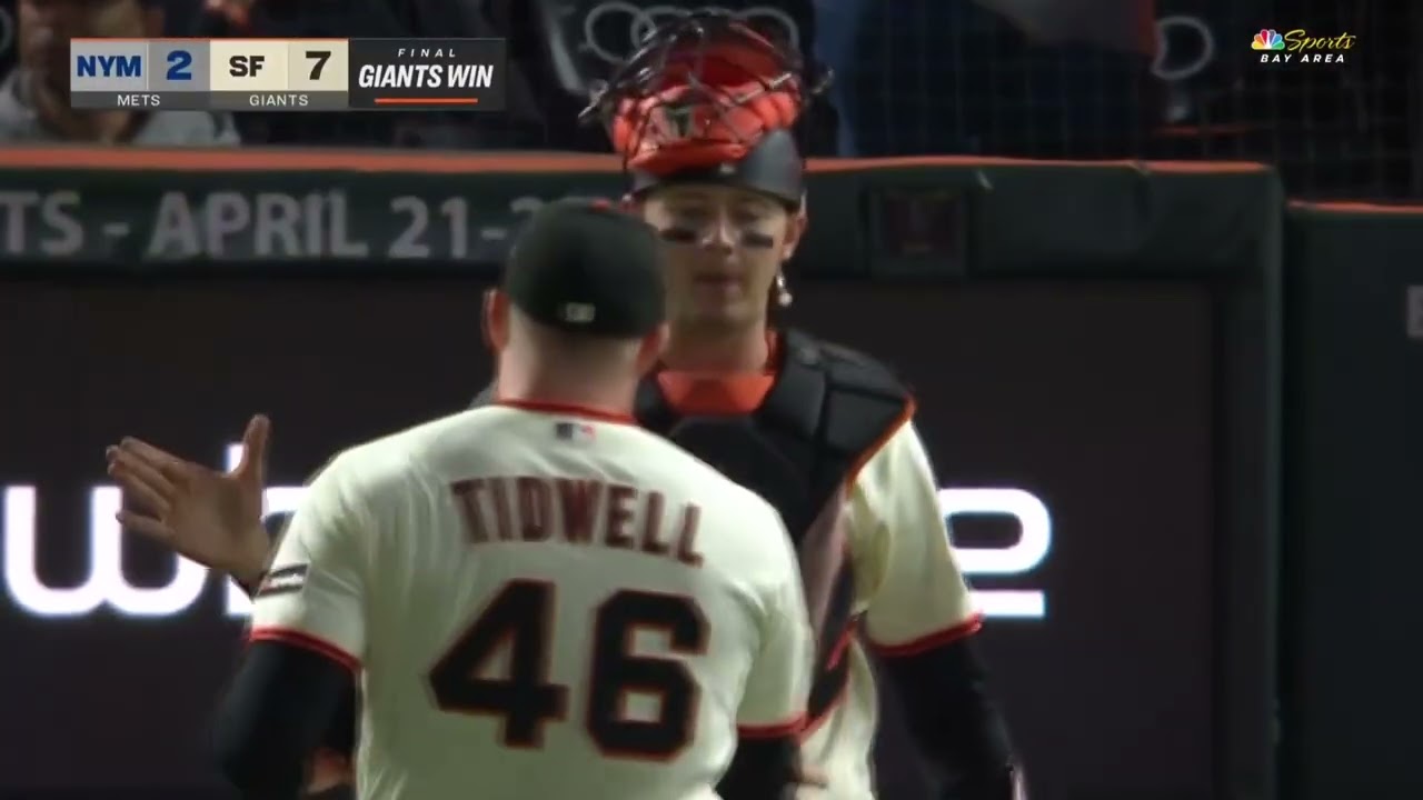 Daniel Susac receives lineup cards from umpire Nestor Ceja following his outstanding MLB debut