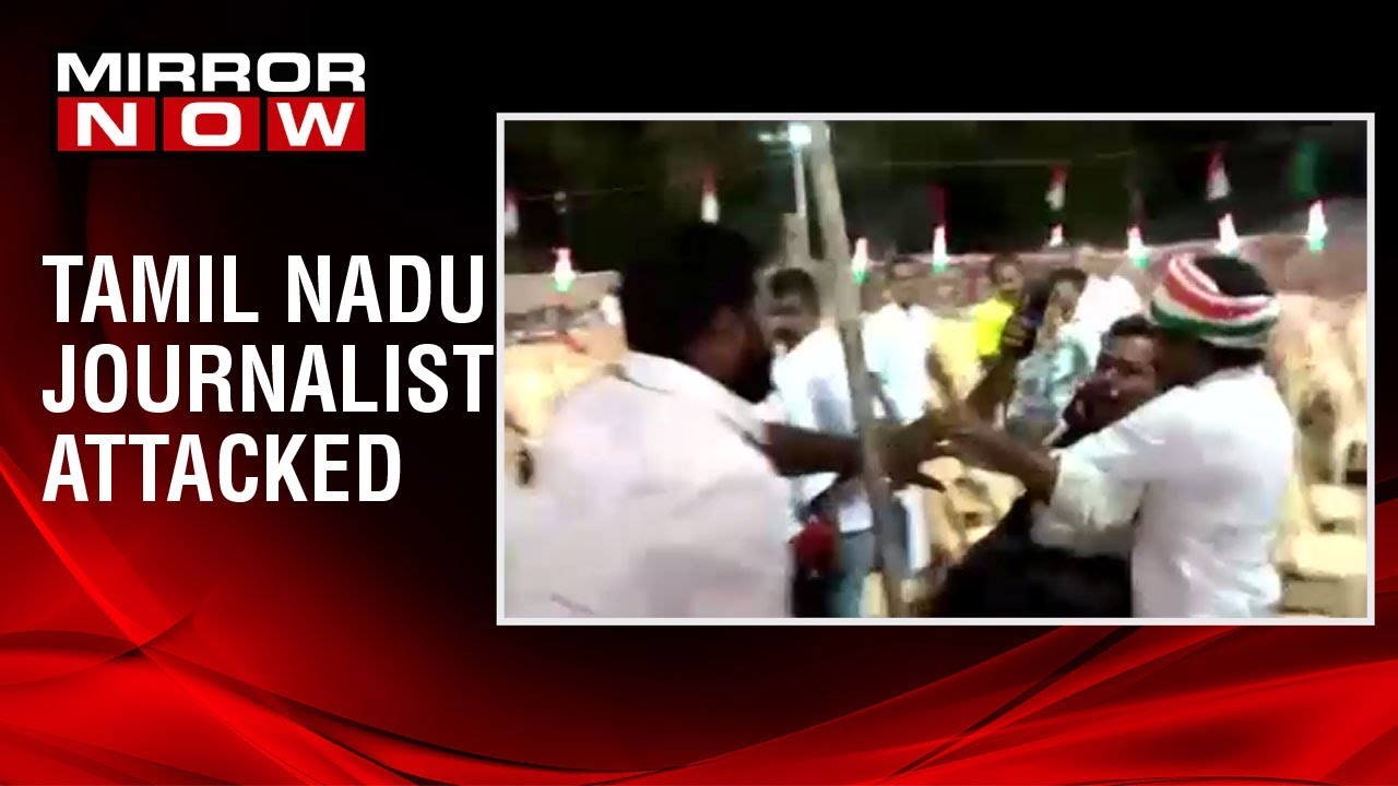Photojournalist from a Tamil magazine attacked by Congress workers for filming empty chairs at rally