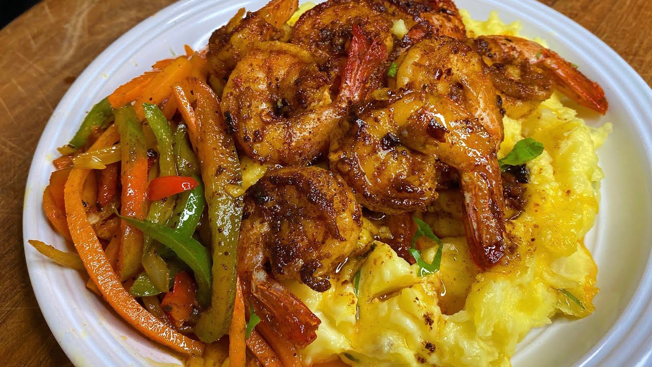 Cajun Shrimp over Creamy Mash Potatoes. Extremely Delicious! 🤤