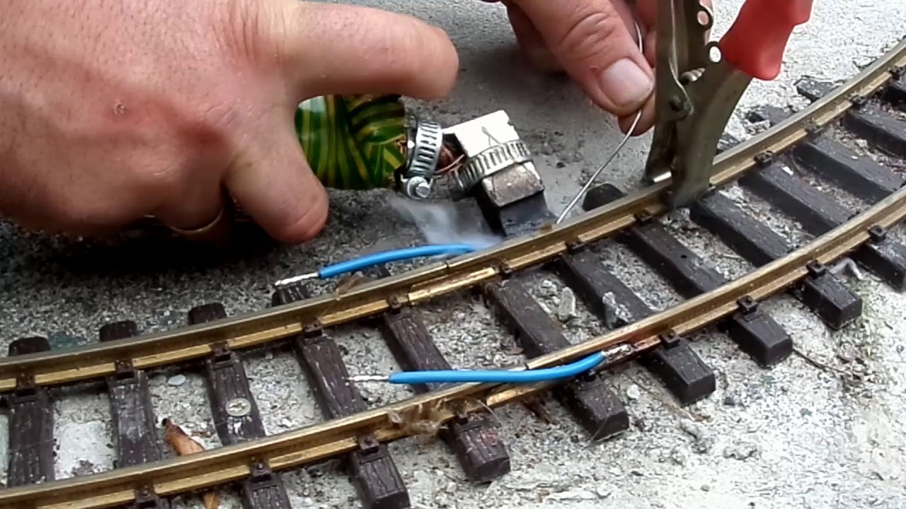 My garden layout soldering the rail joints.