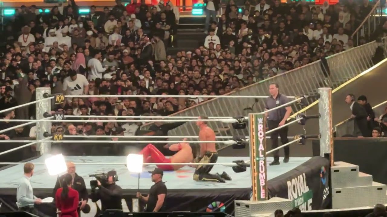 Motor City Machine Guns and Shinsuke Nakamura defeated The New Day and Grayson Waller (end of match)