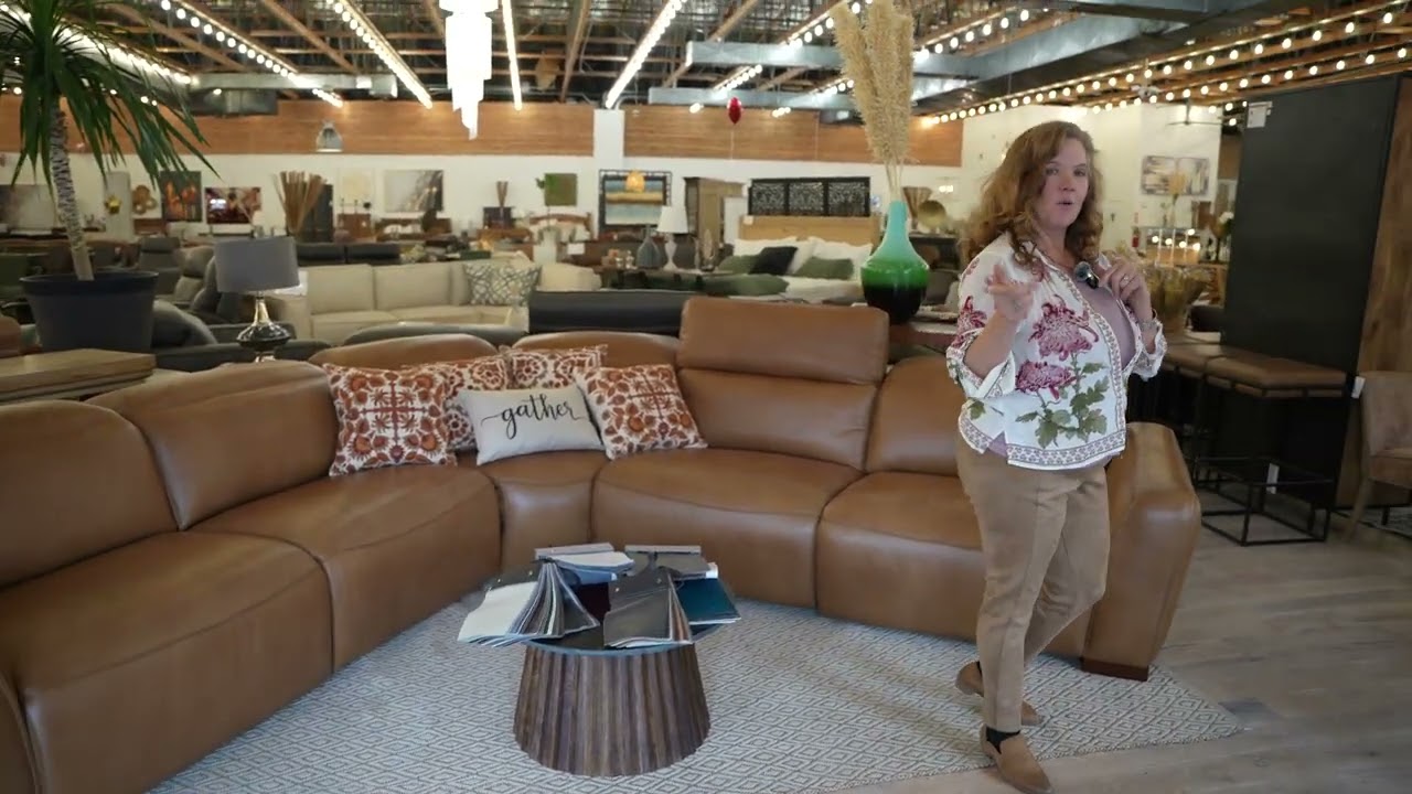 Samsara leather reclining sectional with drop down headrest