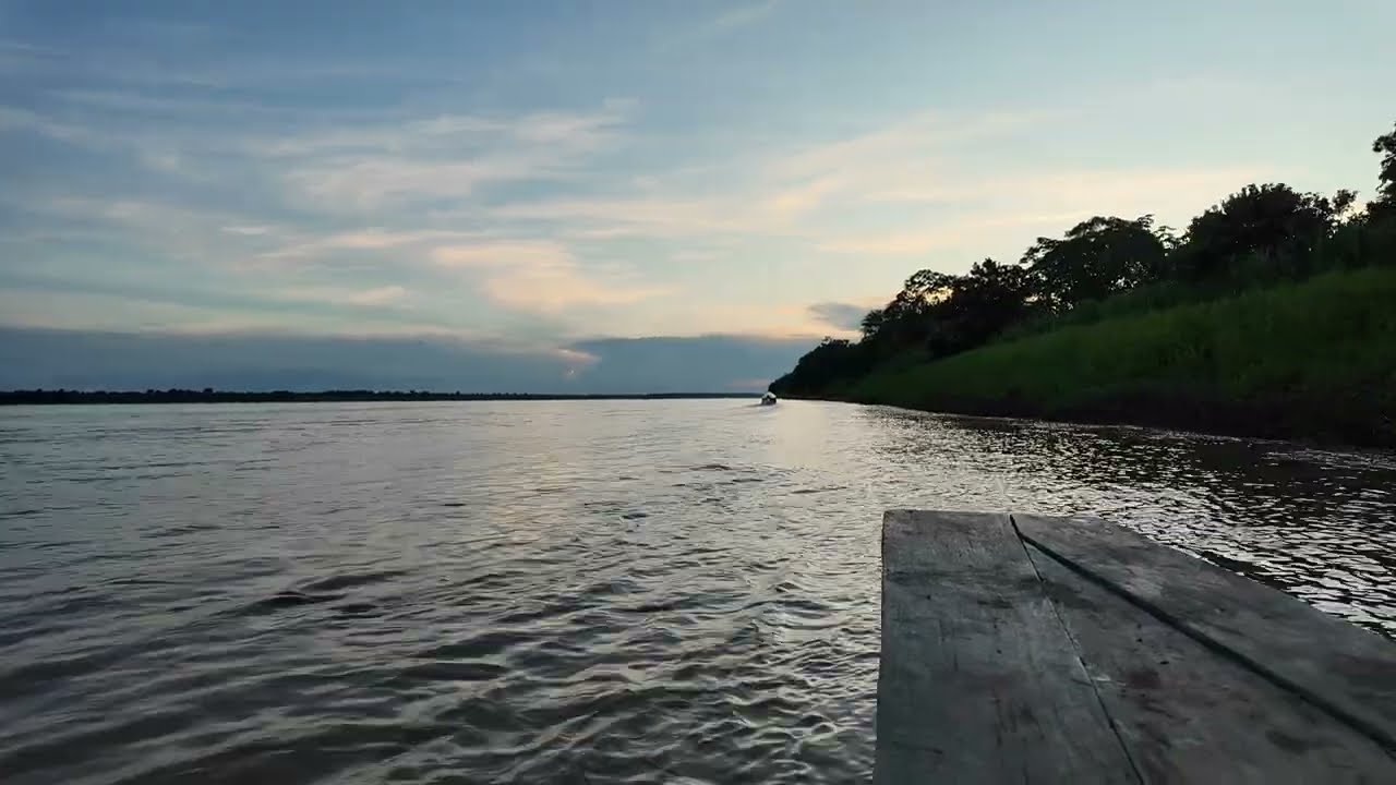 River boating on the Amazon to a native village outside of Iquitos, Peru.