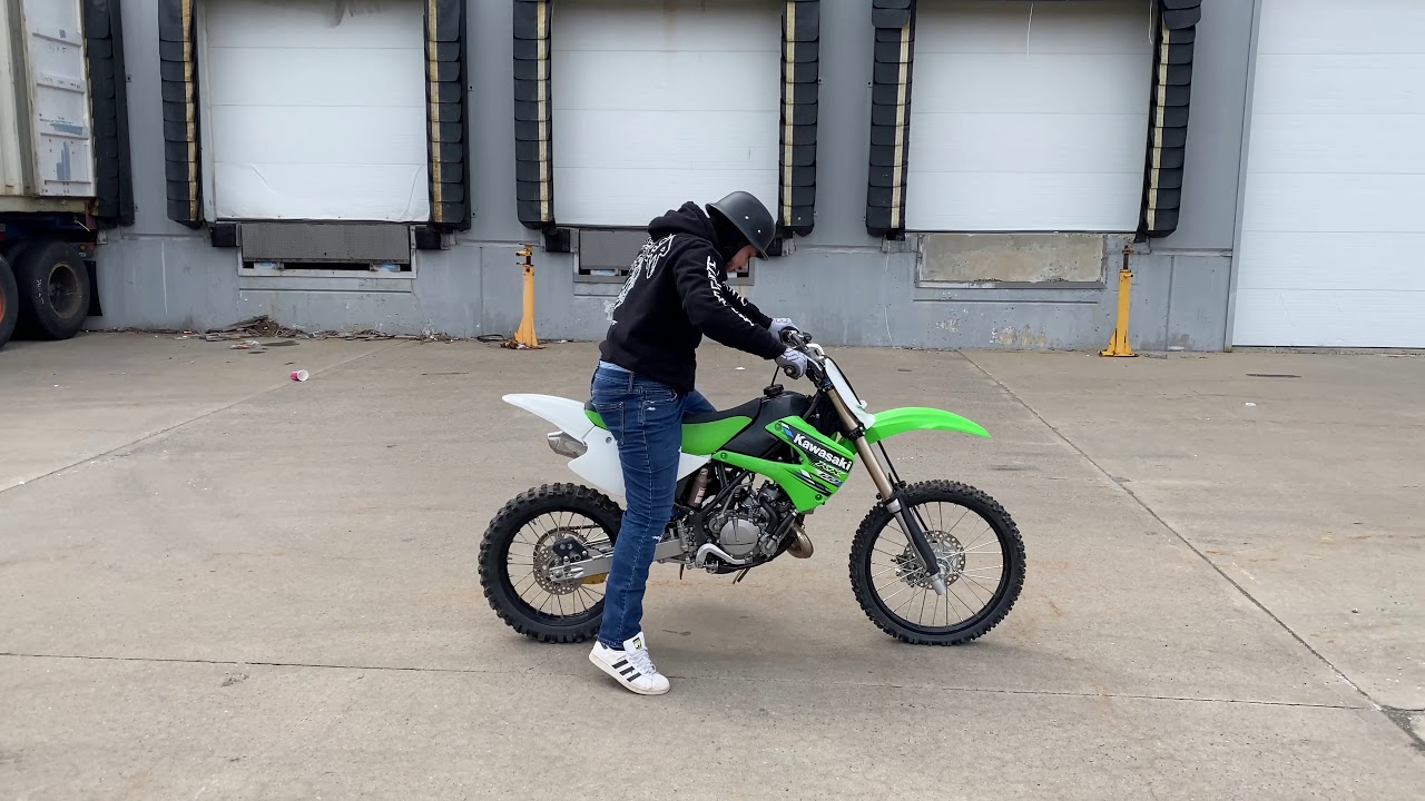 Day 2 learning to wheelie on a kx100