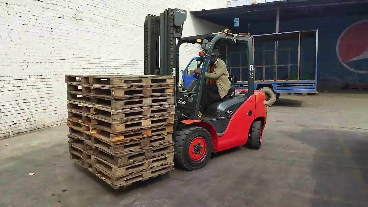 Sit Down Counterbalance Loading Empty Pallets Onto a Truck @ForkliftSkills